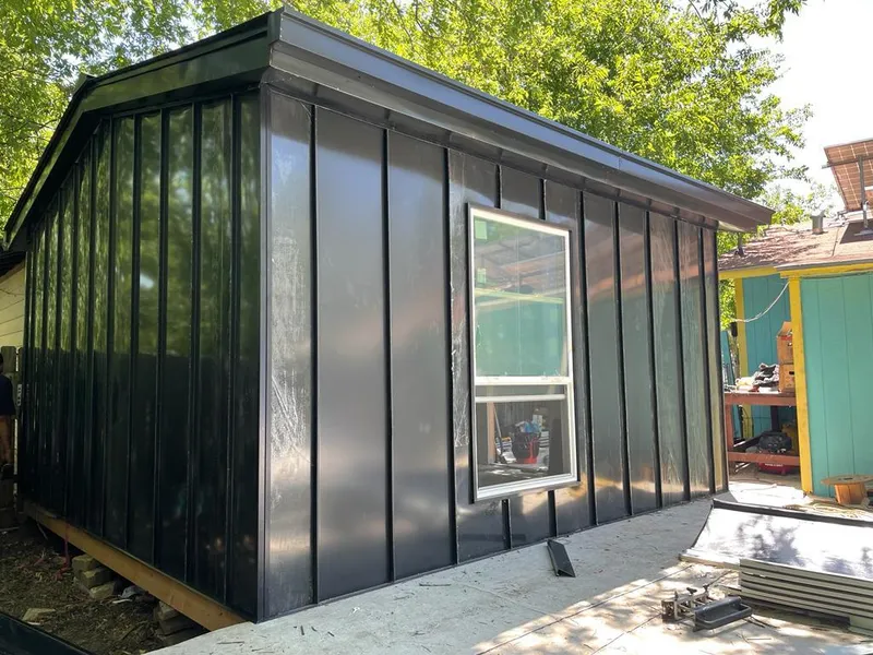 Black standing seam metal wall panels for Metal Roof Installation in Elfers